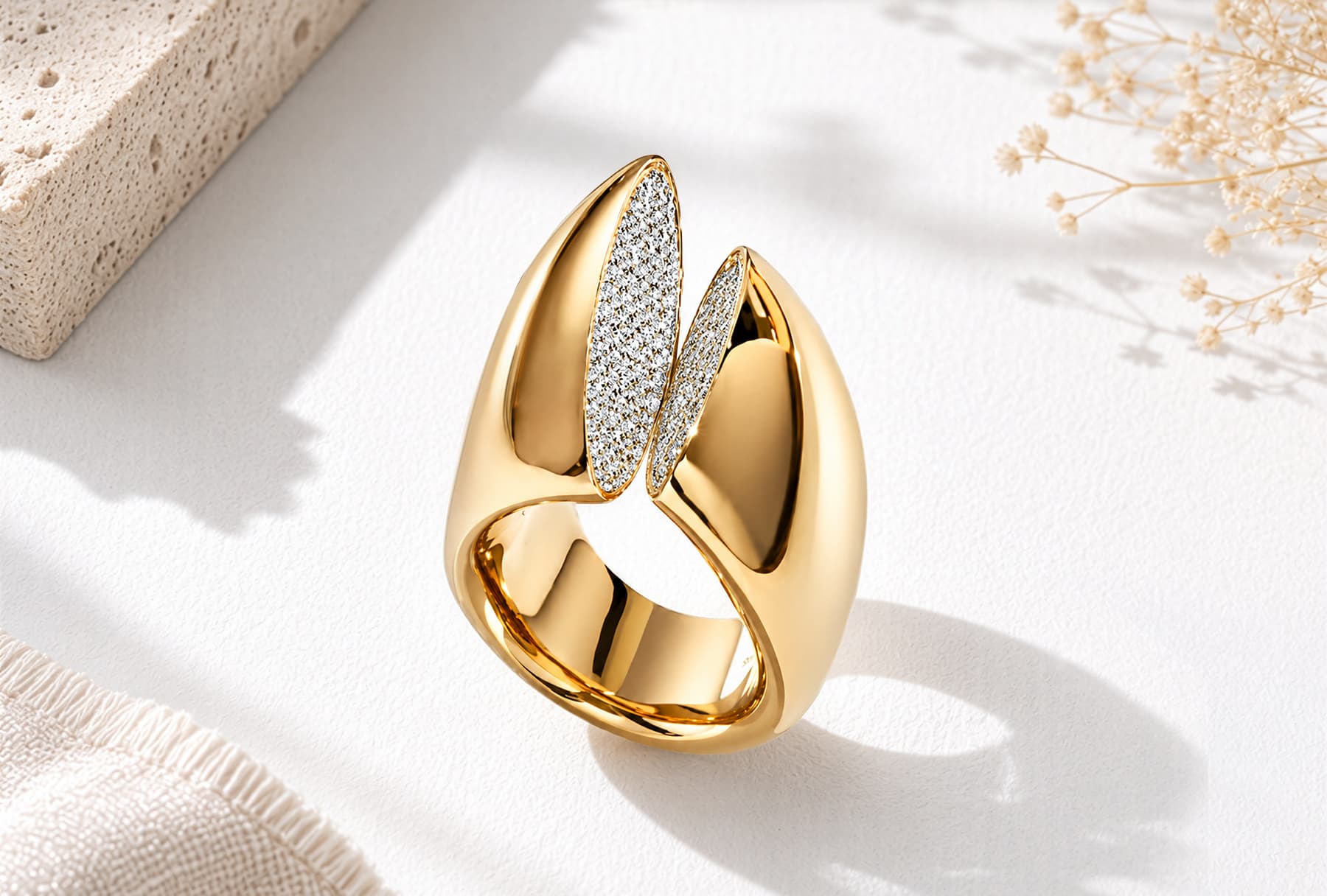 Diamond ring styled with ivory props